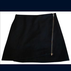 The Gap Black wool lined mini skirt with side zipper. Size 4. Never worn.